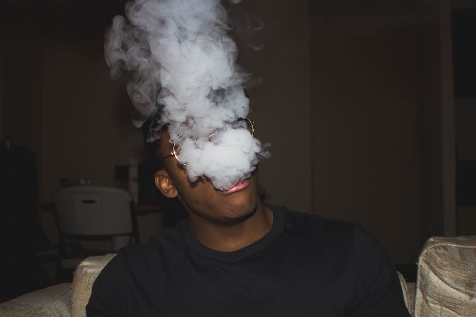Customer enjoying Hitz Vape in a relaxed setting | hitzvape.com
